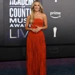 Lainey Wilson orange dress